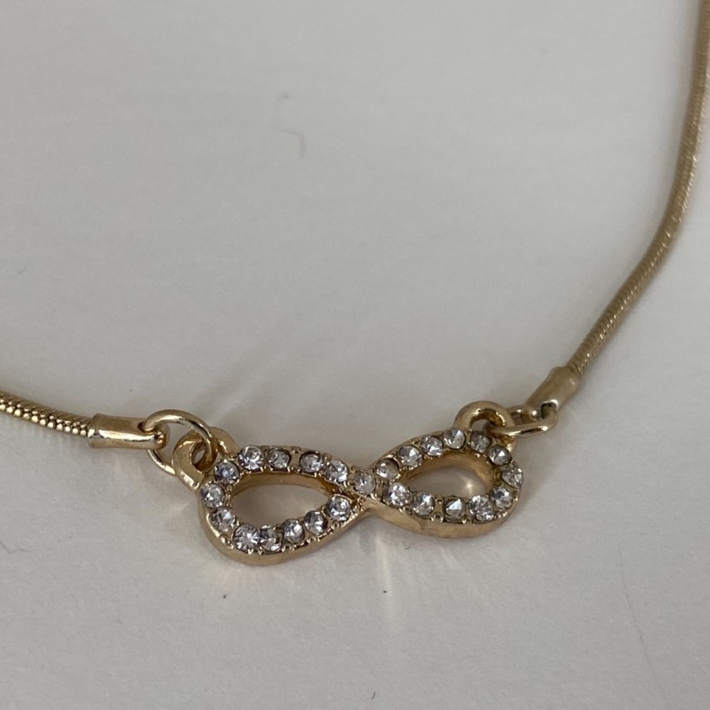 R.J. Graziano Infinity Charm in Crystals‎ Gold Tone 16” - 19” long